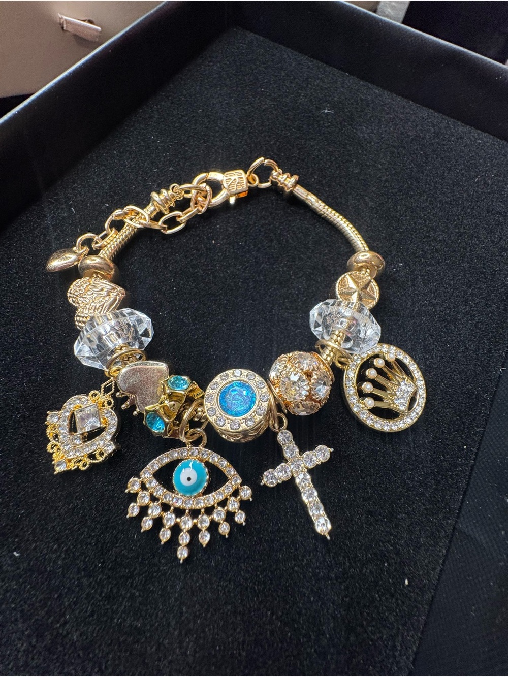 Gold Charm Bracelet with Blue Evil Eye and Crystal Accents